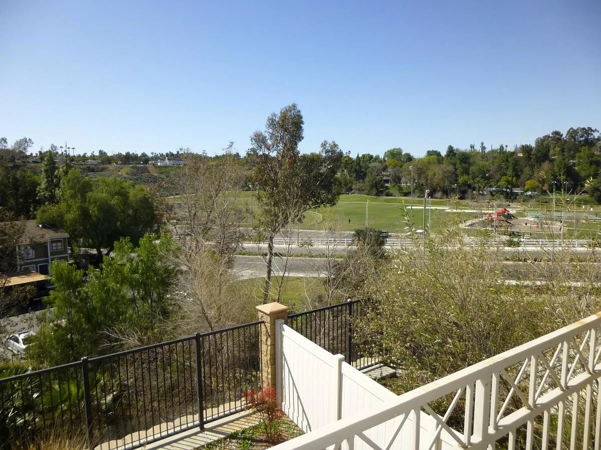 Creekside Terrace backyard as seen from the second-floor balcony.