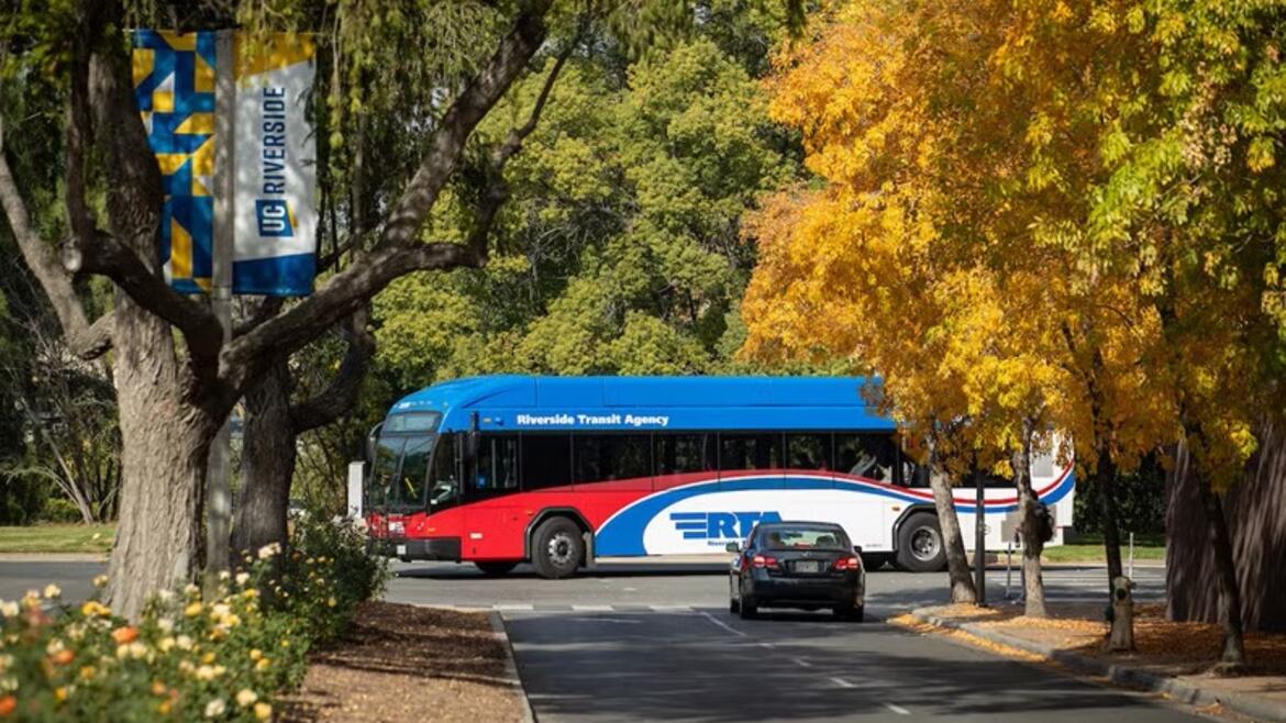 An RTA bus drives around the UCR campus.