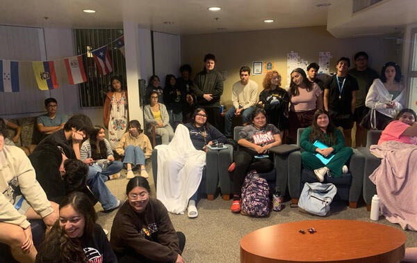 Mundo students group photo in living room