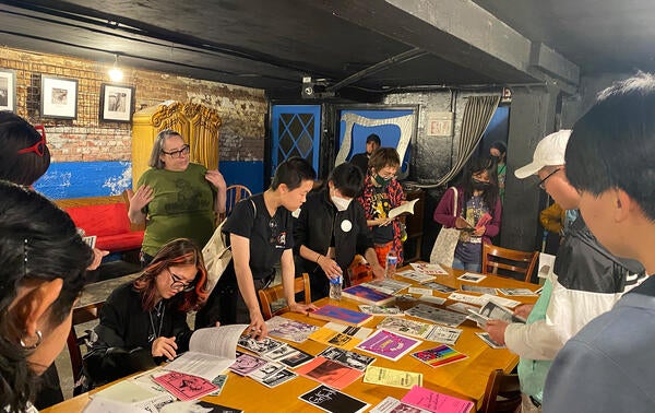 Stonewall check in desk with students 