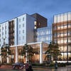 Exterior rendering of the North District 2 Campus Apartments at night.