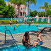 Students swimming in the pool at the Plaza.